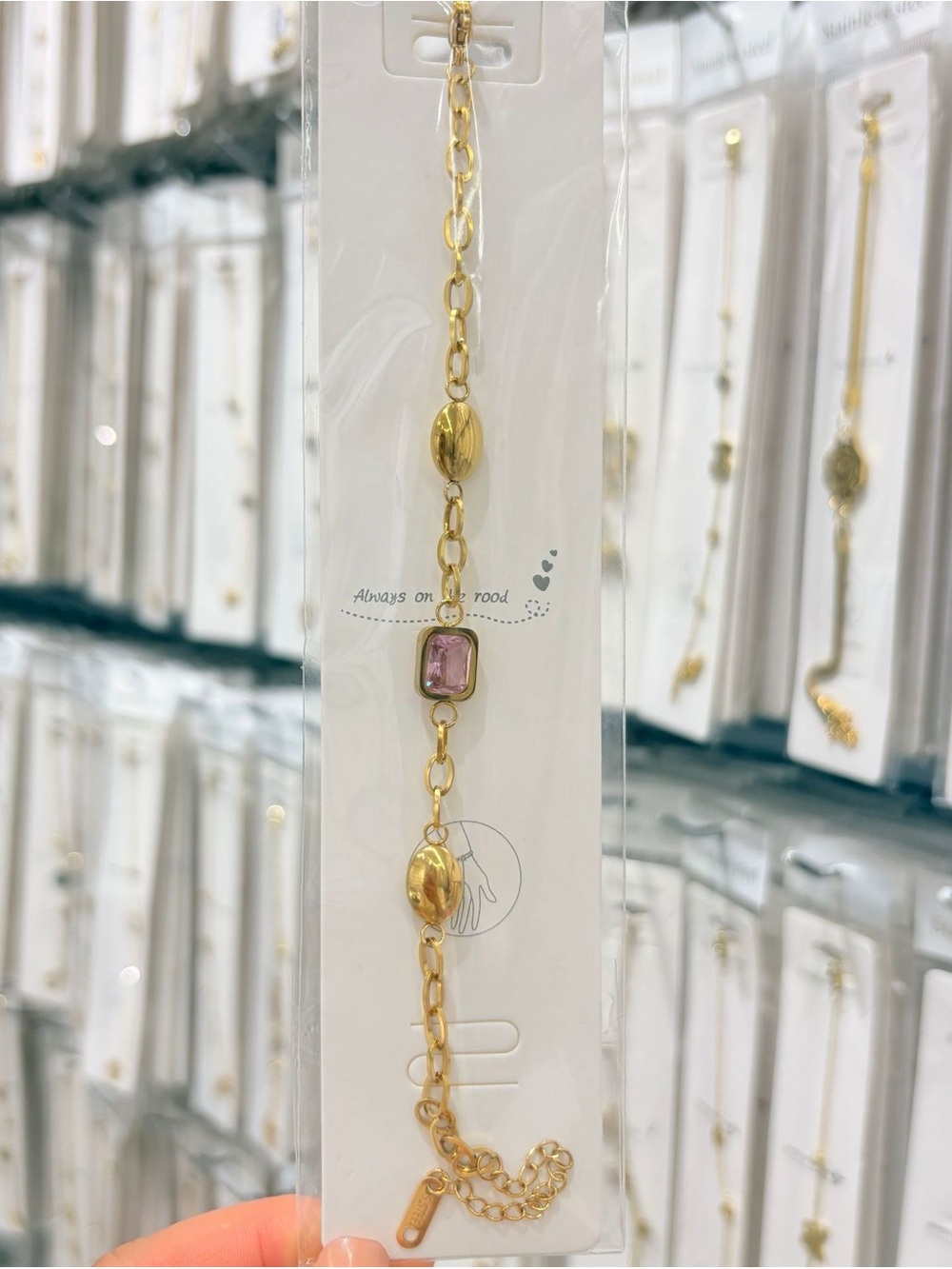 Gold-Tone Bracelet with Pink Gem Accent